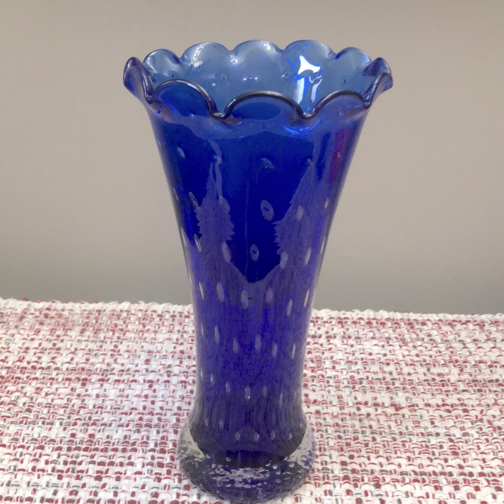 Cobalt Blue glass 9” vase is EUC.